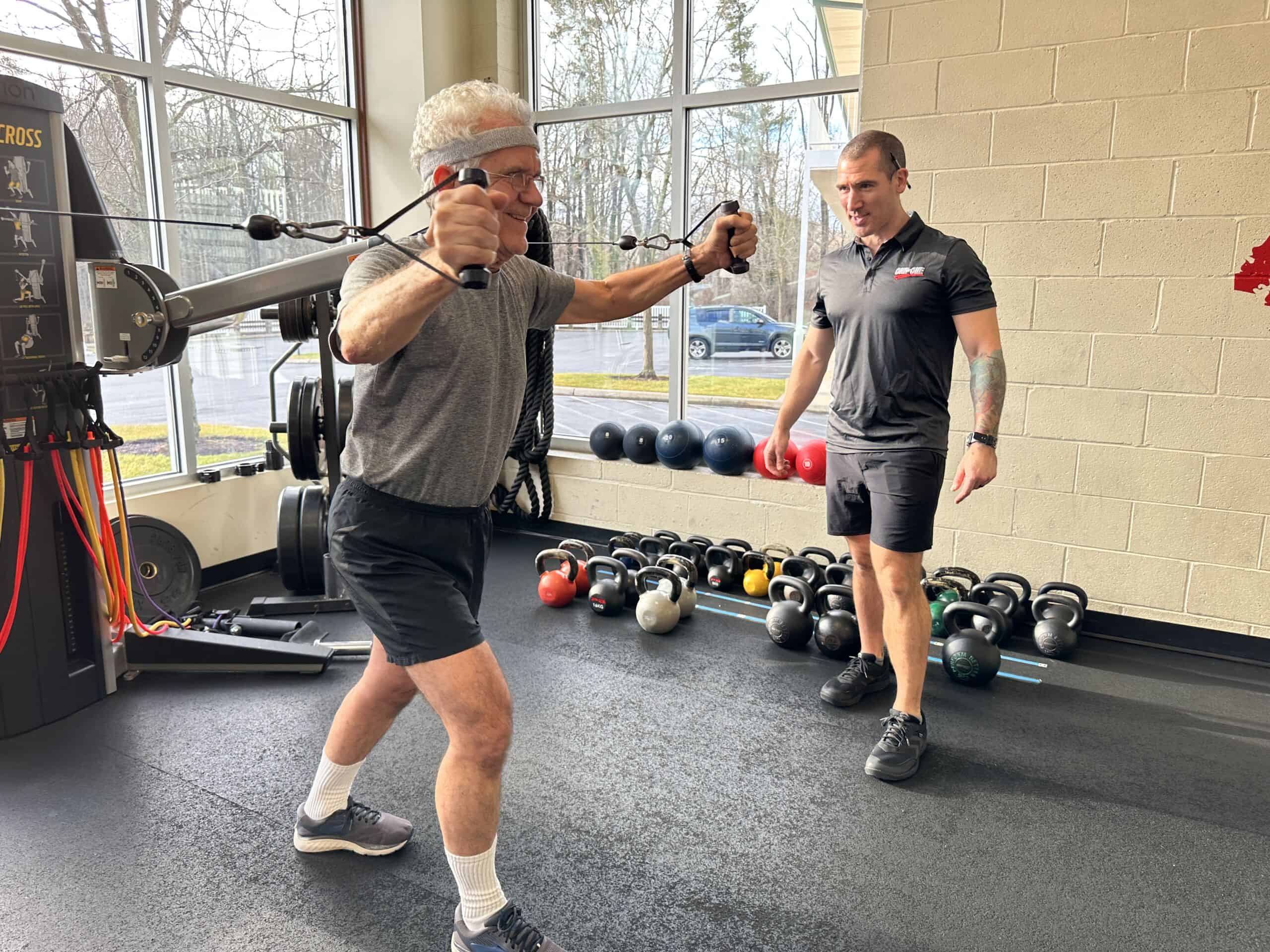 Working out with encouragement for personal training and fitness success.