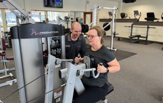 Personal training on a machine at one on one for fitness and weight loss.