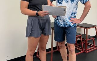 Improved ALT text: One-on-one fitness coaching session at State College Fitness Consultants.